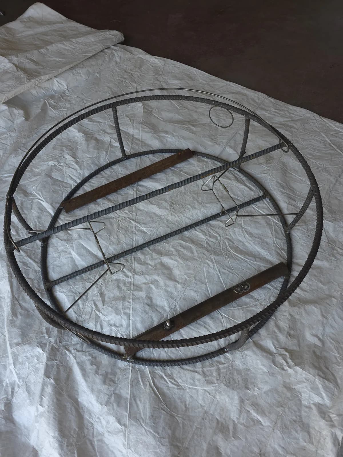 Bare CCP trap from above showing both stainless tunnel frames, crossbars and weight bars before wire