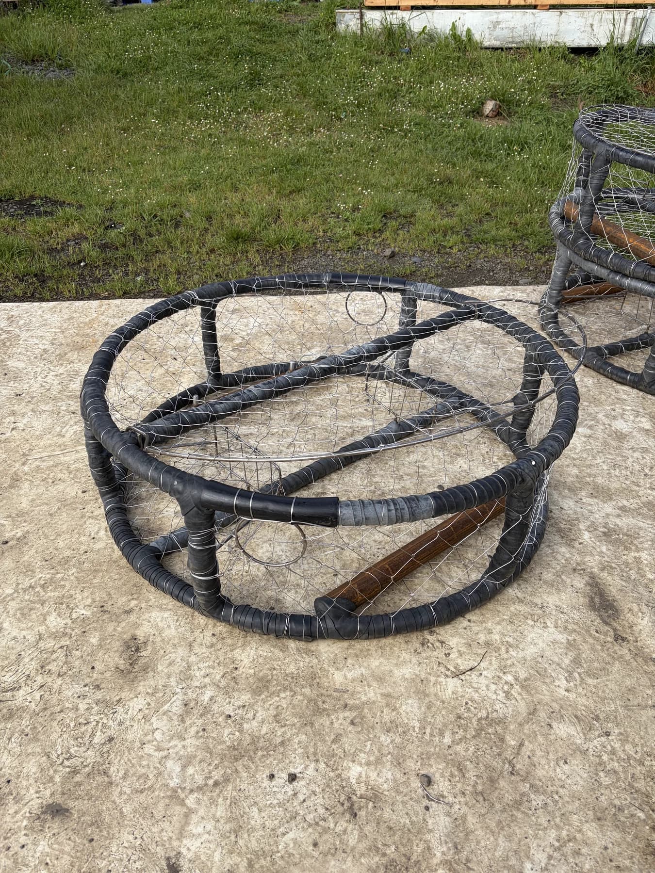 Finished commercial CCP crab pot showing wrapped frame and knitted wire